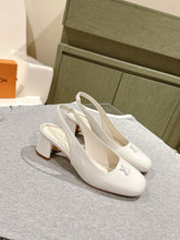 SWING SLINGBACK PUMP 55 MM IN WHITE PATENT CALFSKIN